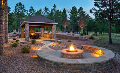 Harvester Landscapes Cherry Creek Magazine 2024 tips trends outdoor living Cherry Creek homes Denver homes Colorado homes sustainable landscapes functional outside spaces smart lighting and technology modern hardscaping sustainable luxury