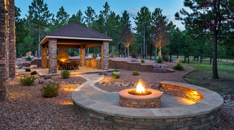 Harvester Landscapes Cherry Creek Magazine 2024 tips trends outdoor living Cherry Creek homes Denver homes Colorado homes sustainable landscapes functional outside spaces smart lighting and technology modern hardscaping sustainable luxury